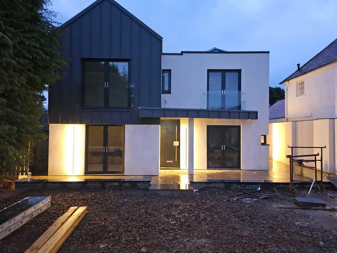 British Villa exterior with black-framed aluminium windows